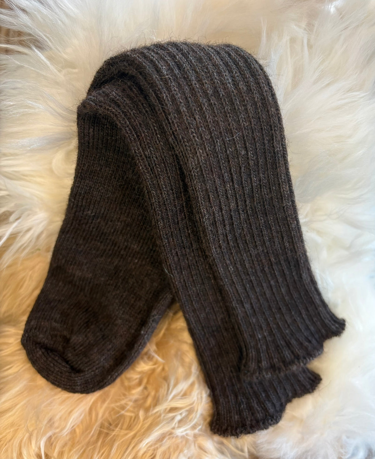 Charcoal soft topped everyday alpaca sock on fluffy background