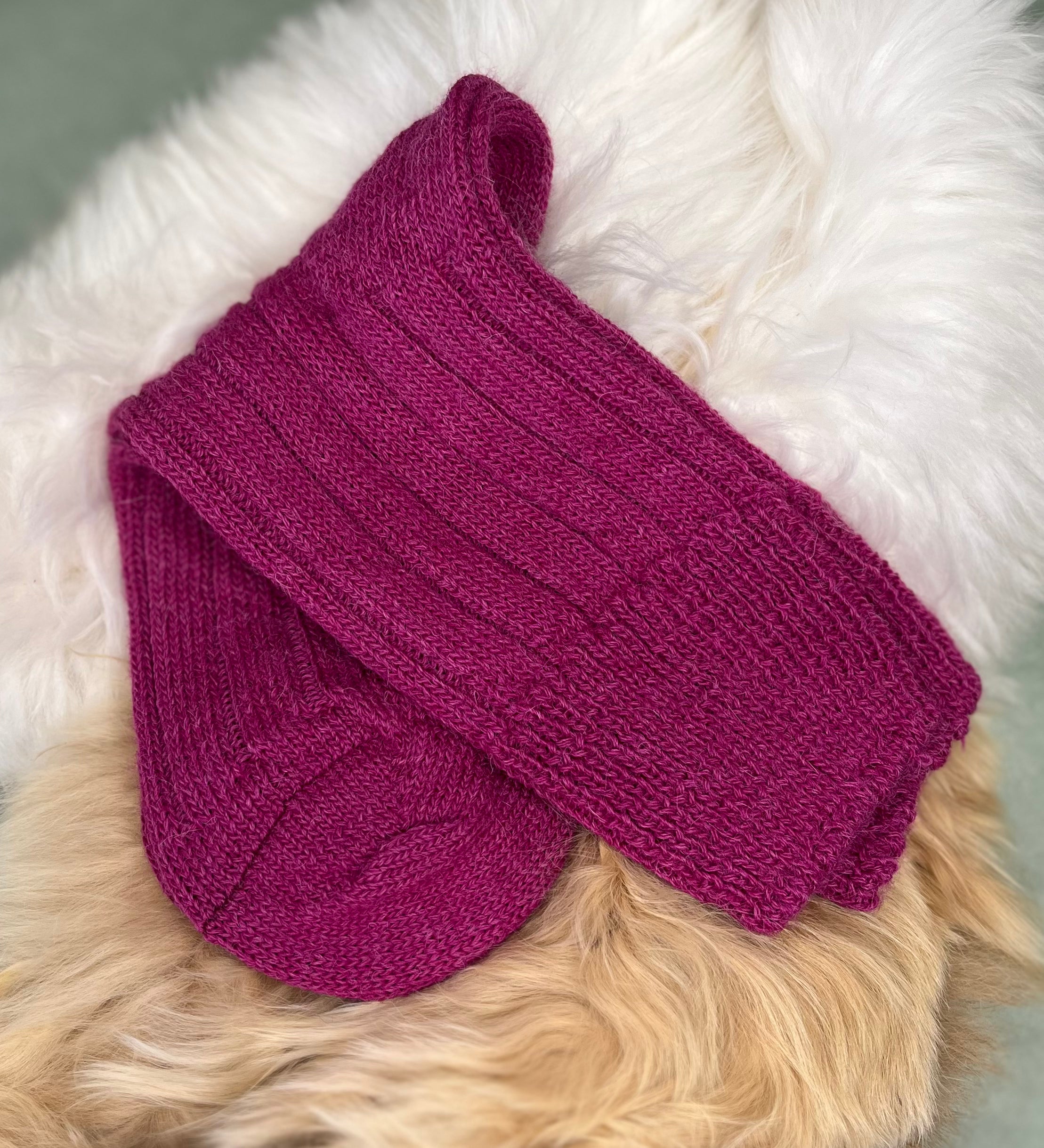 dark raspberry alpaca bed sock fluffy background