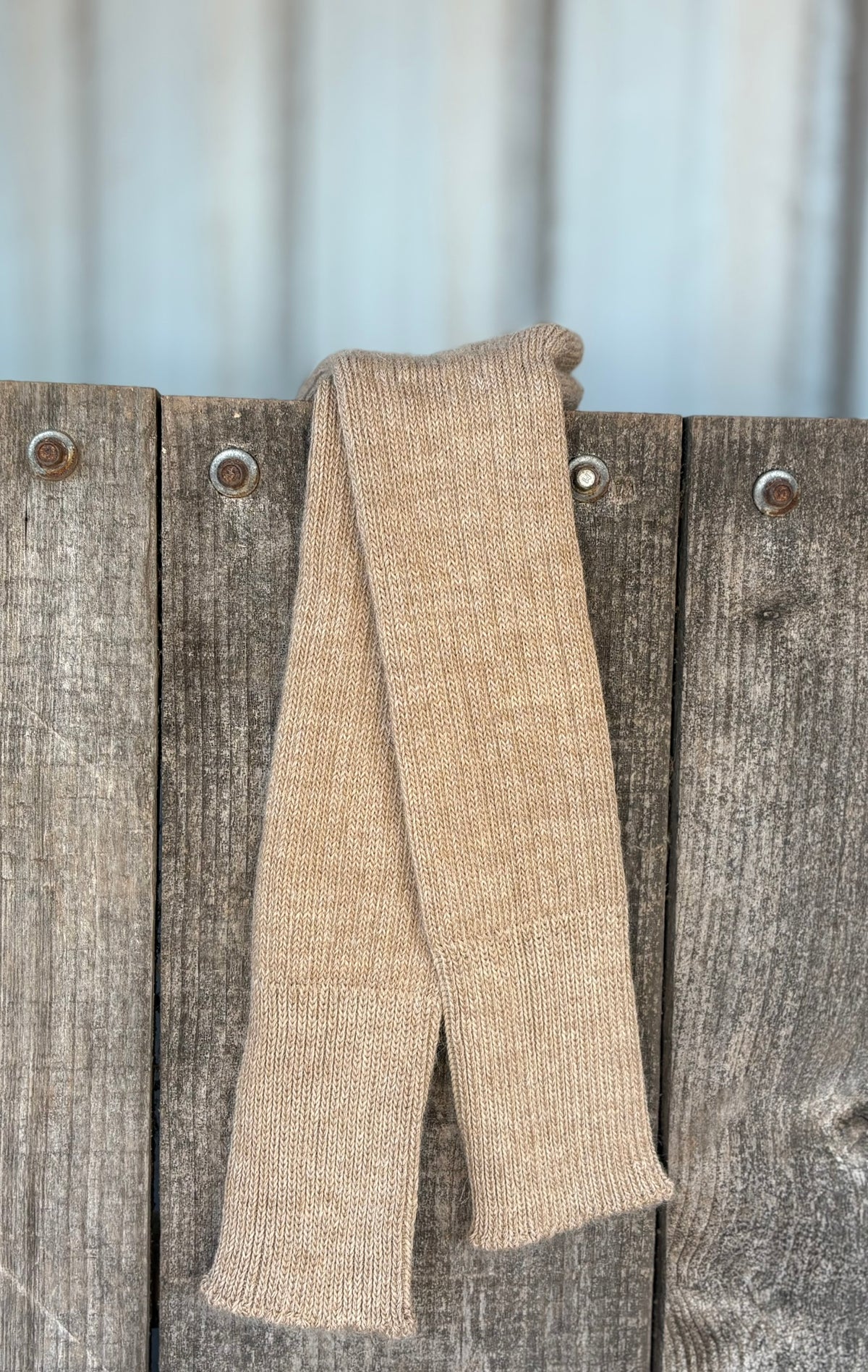 fawn three quarter alpaca socks on wooden gate