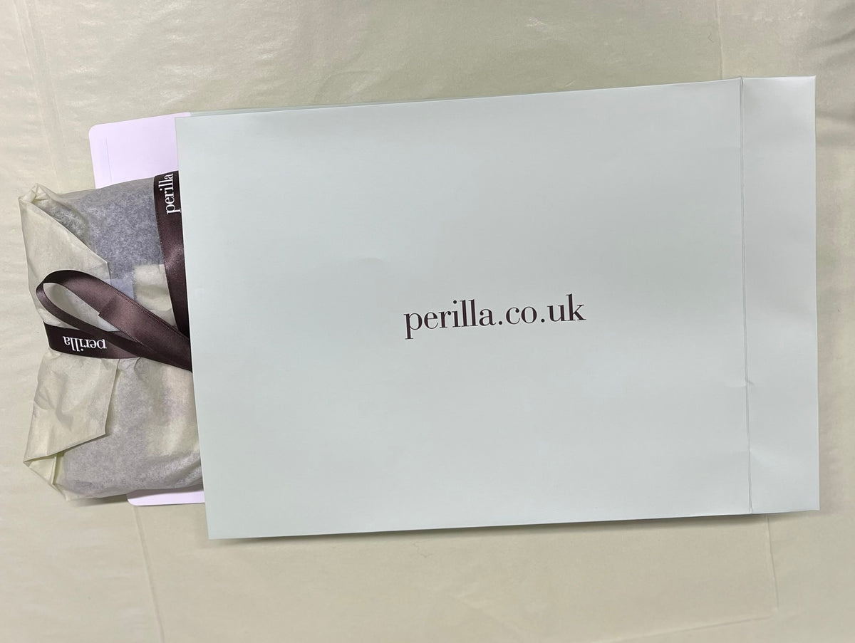gift envelope with gift wrapped socks inside