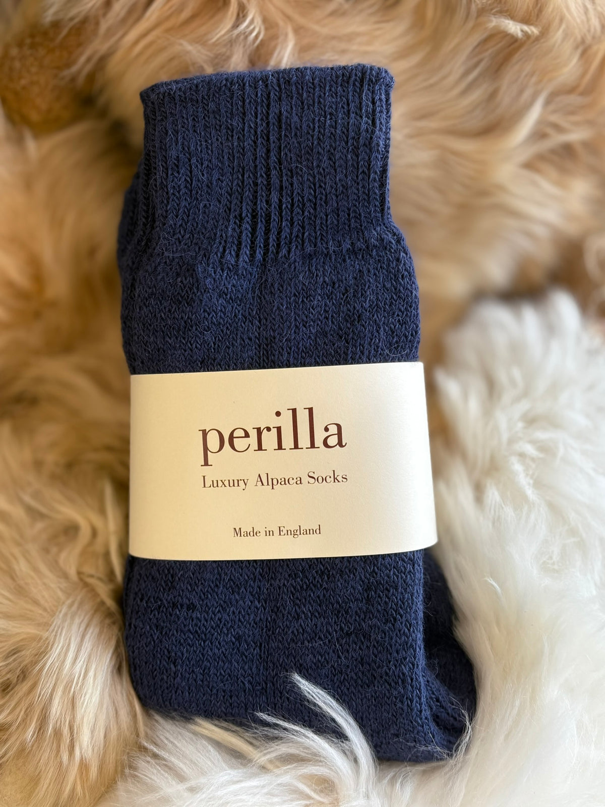 Navy Walking alpaca socks fluffy background