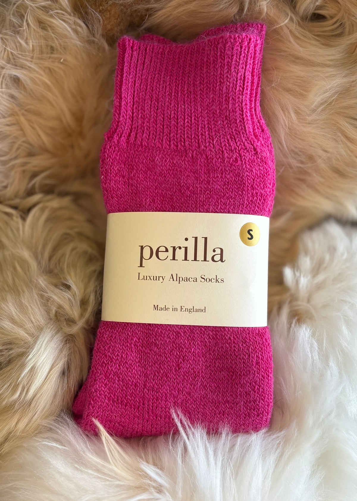 raspberry alpaca walking socks fluffy background