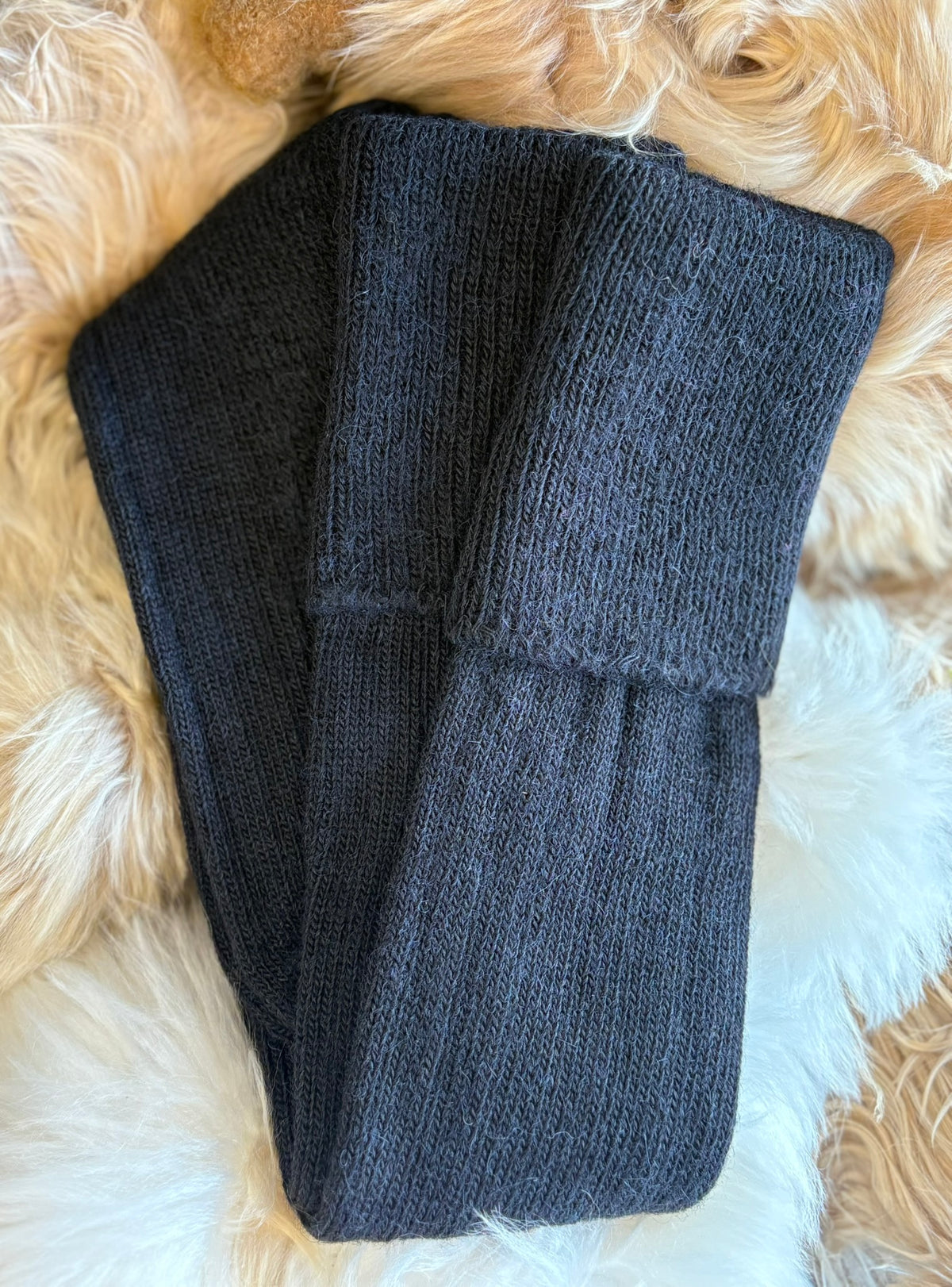 black alpaca country socks fluffy background