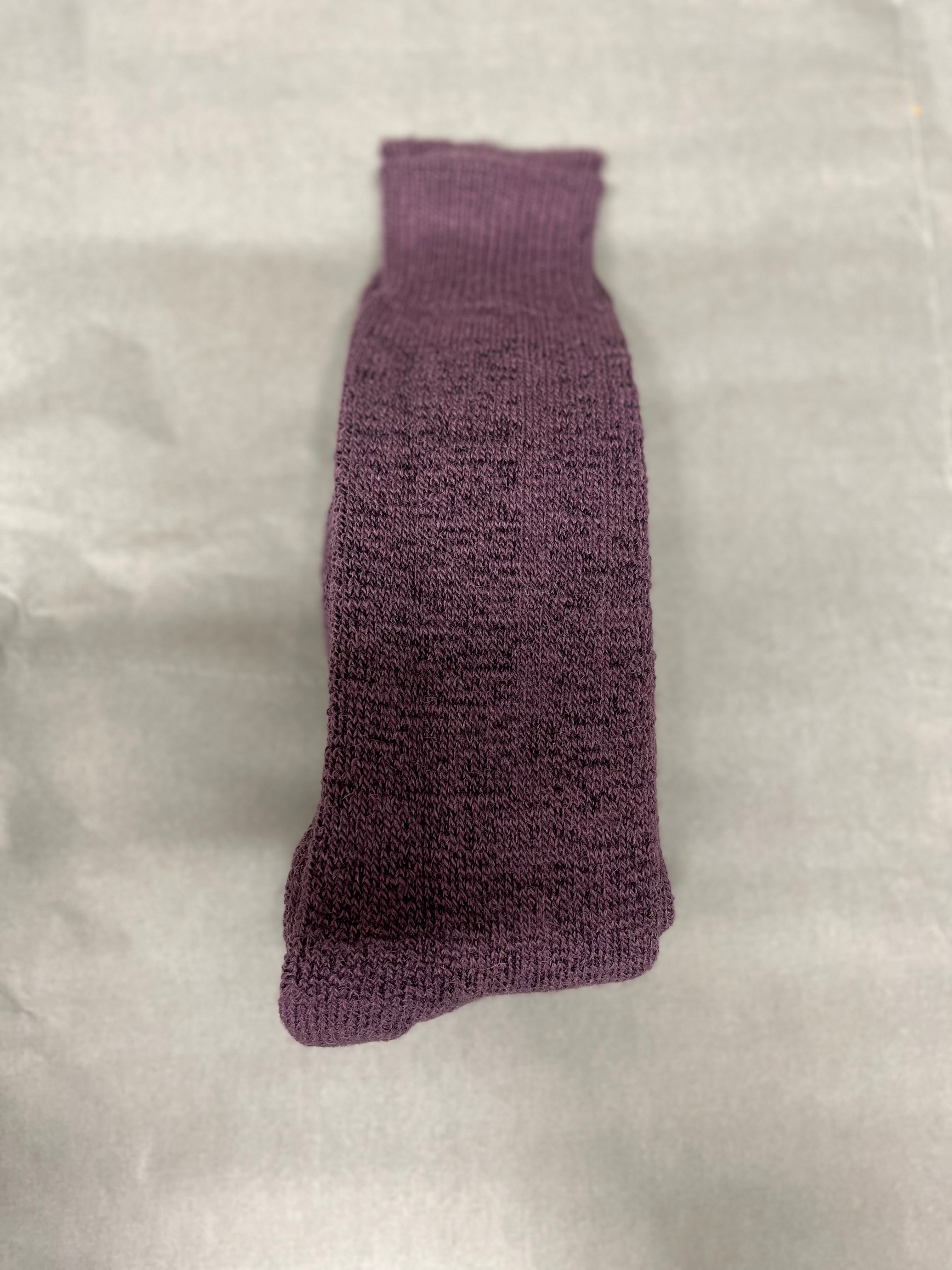 grape walking alpaca sock pale green background