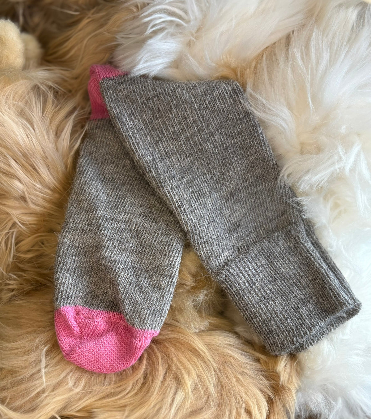 grey with bright pink toe and heel everyday alpaca socks fluffy background