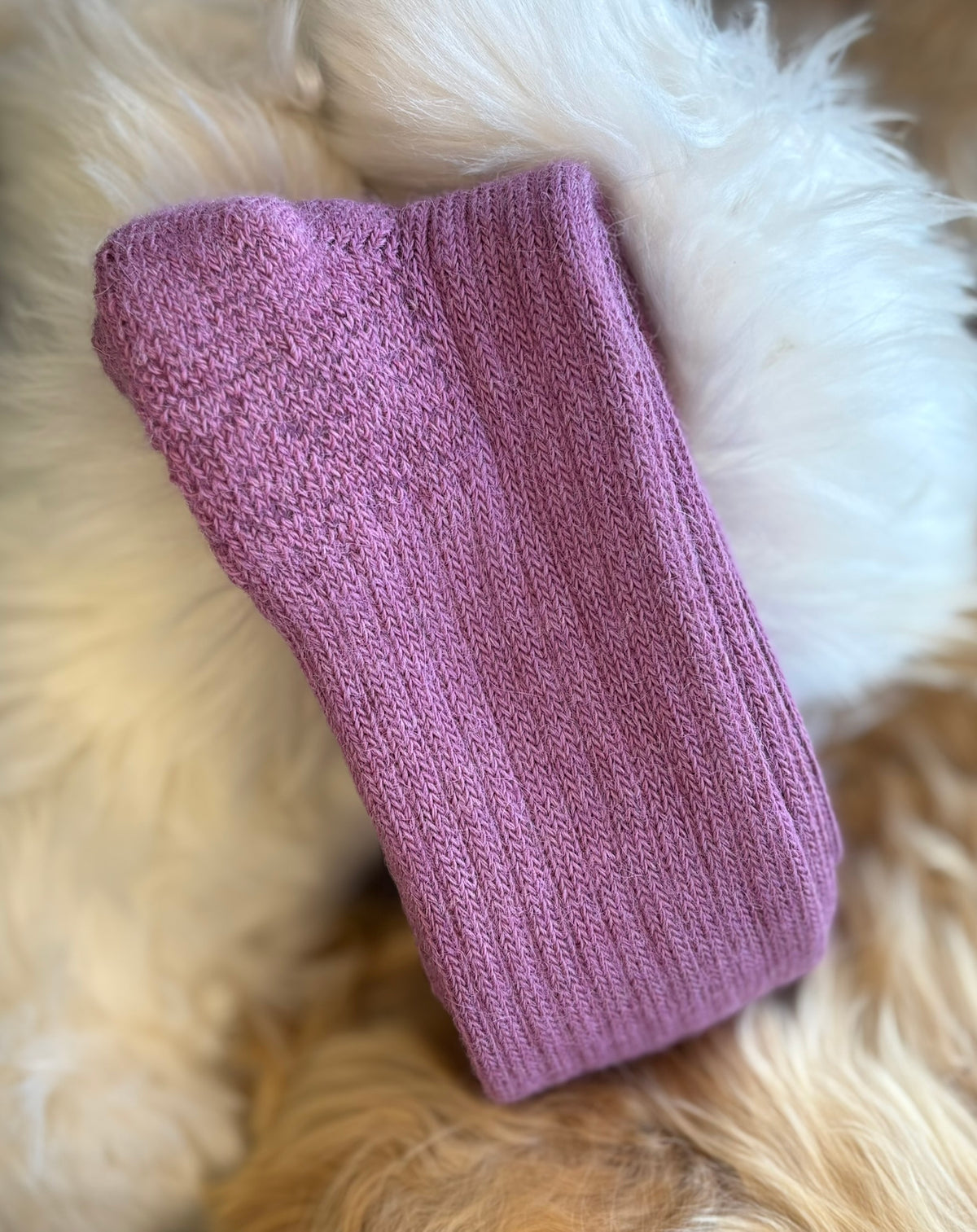 heather short ribbed alpaca socks on a fluffy white and beige surface