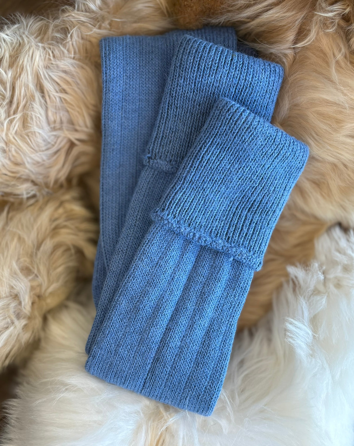 mid blue alpaca country socks fluffy background