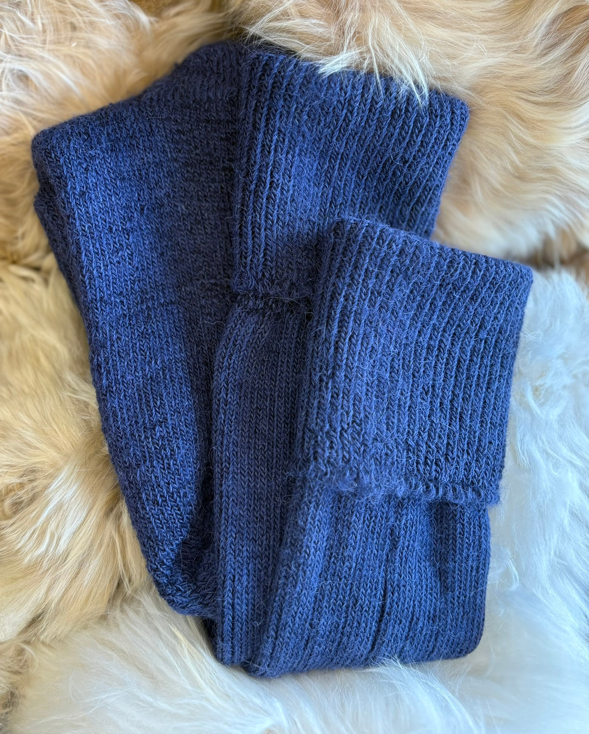 navy alpaca country socks fluffy background
