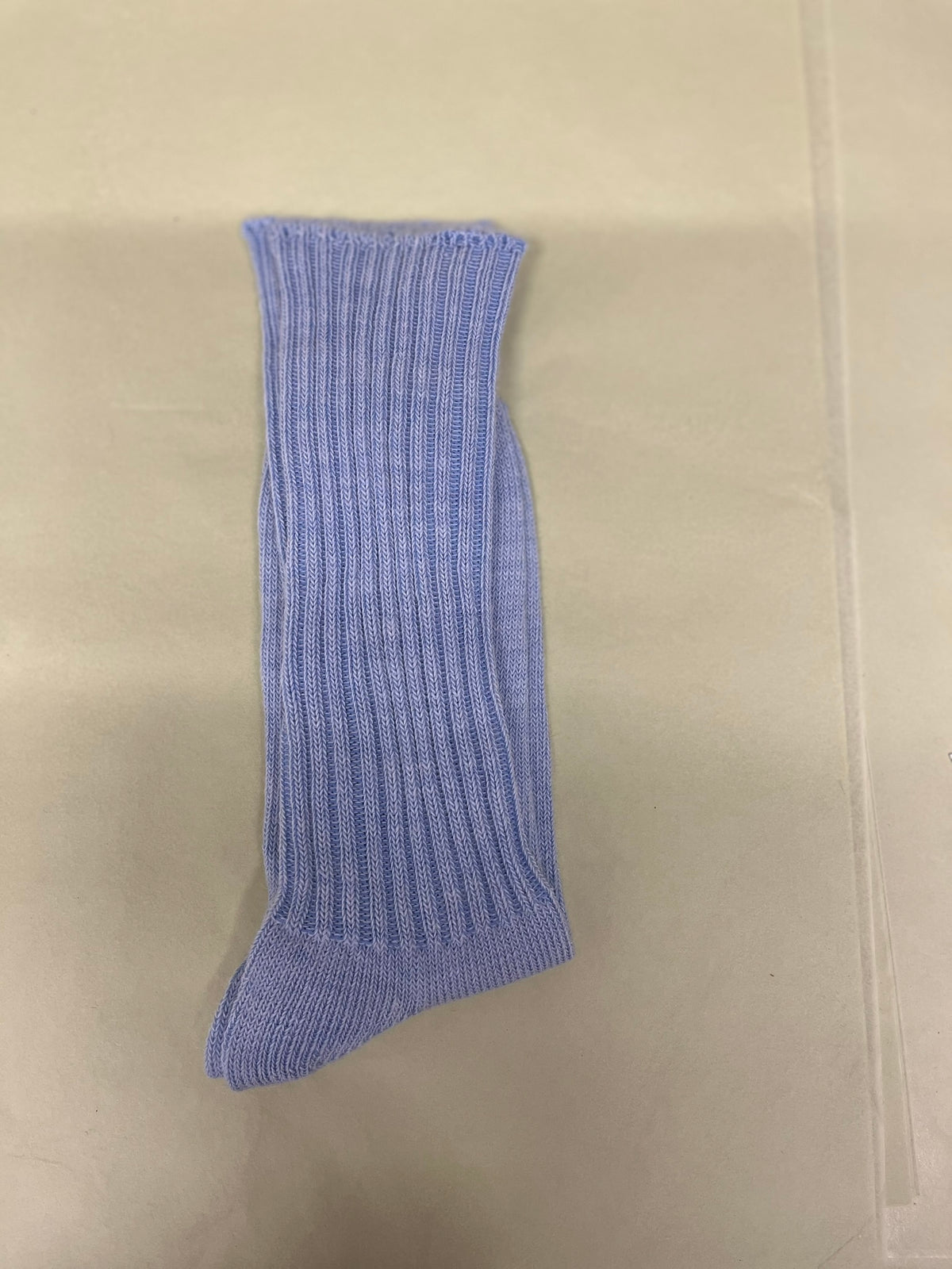 pale blue soft topped everyday alpaca sock pale green background