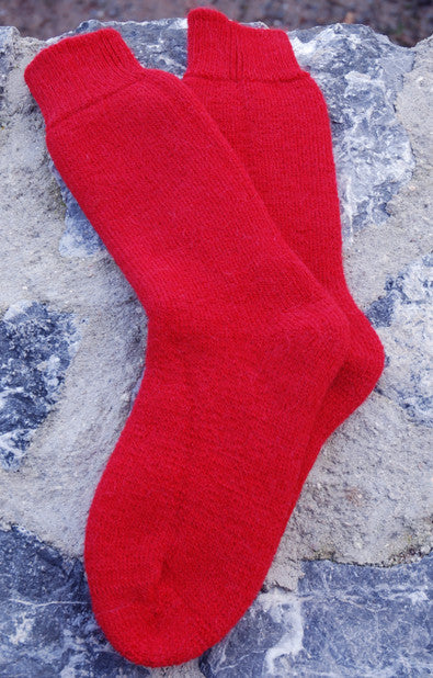 cherry red alpaca walking socks rocky background 